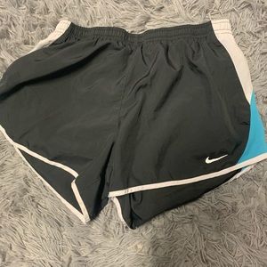 Blue, white, and grey Nike shorts